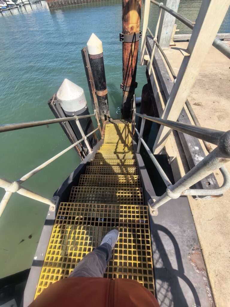 FRP anti-slip stair installation at Glenelg Wharf in Adelaide, supplied by Machs over 10 years ago, still in durable use
