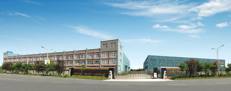 Machs Composite factory exterior view with main building and production workshop